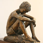 Boy On A Rock
